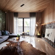 新莊室內設計案例 在客廳區的天花板造型是從電視牆延伸上去的木皮 (1)